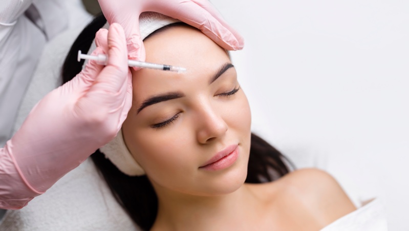 young woman botox forehead